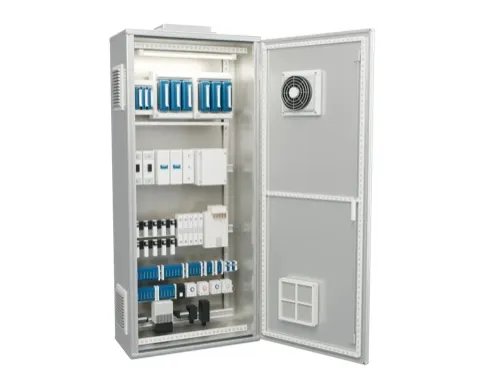Open silver enclosure with blue fuse covers, white electrical modules, terminal blocks, heaters and a right-hand fan door